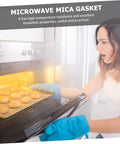 Woman using Ten Piece Microwave Mica Sheets For Oven Insulation And Heat Resistant Shield Reusable Mica Plates to protect oven