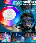 Diver holding 2 Pack Floating Pool Lights With Bluetooth Speaker 2 In 1 RGB Pool Lights IP68 Waterproof 360 Degree Hi Fi Sound
