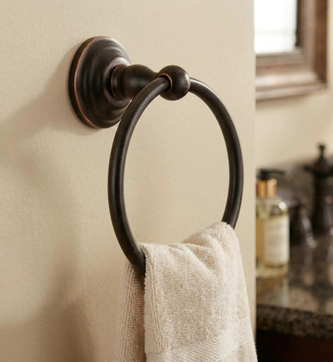 800 Series Oil Rubbed Bronze Towel Ring With Concealed Screw Mounting System in bathroom, holding a white towel, slick modern look