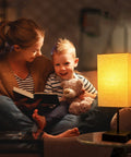 Pair Of Touch Lamps With USB Port And Outlet, 3 Way Dimmable Bedside Lamps in living room with mother and child reading