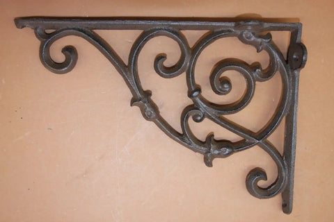 Kick Up Your Space With These Heavy Duty Victorian Corner Shelf Brackets Solid Cast Iron Rustic Brown Finish Built Tough For Windows Vintage Look Set Of Four, close-up view of intricately designed bracket.