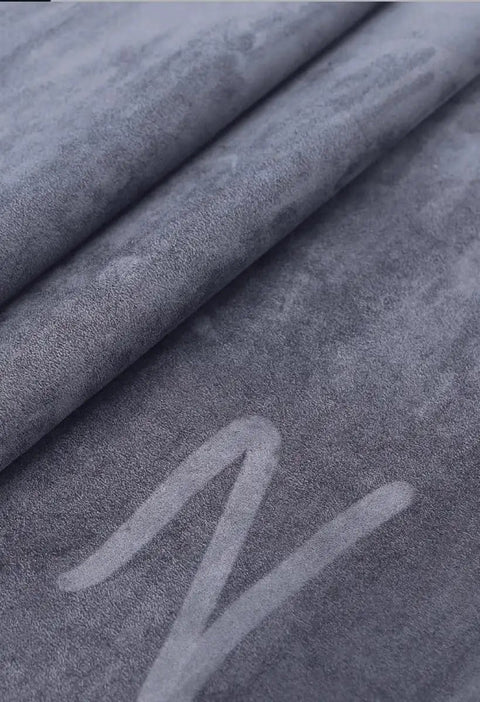 Close-up image of 54x20 inch grey faux leather Self-Adhesive Leather Repair Patch For Couch Sofa Car Seat Chair And Vinyl Furniture.