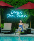 Custom Outdoor Neon Sign Waterproof LED Light Up Sign For Backyard Patio Pool Garden Wedding And Party Use Personalize Your Text With IP67 Power Supply For Rain Or Shine neon sign by a pool at night.