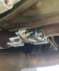 Exhaust Flange Repair Piping Kit 2.5 Inch ID To 2.5 Inch OD With Gasket And Bolt installed on vehicle exhaust system.