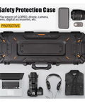 Overhead view of Road-Ready Waterproof Gear Case With Wheels For Cameras Computers Bows Arrows Fishing Rods Golf Clubs And More, Heavy Duty Tool Box With Thick Foam Padding And Dual Handles For Easy Carry Or Pull, surrounded by digital equipment and clothing.