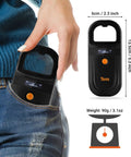 Person placing Pet Microchip Reader With D Ring Included For Easy Carry Portable RFID Scanner into jeans pocket, size and weight shown.
