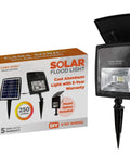 Outdoor Solar Flood Light in Black Cast Aluminum with Warm White 2700K LEDs, showing product box and detached solar panel