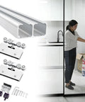 Hella Smooth Aluminum Double Track System For Bypass Closet And Barn Door Hardware Kit parts with a woman operating the sliding door.