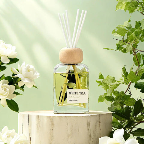 White Tea Reed Diffuser Set Inspired by Westin Hotel Scent on a wooden stand with flowers, 100 ml bottle, non-toxic, gift-ready