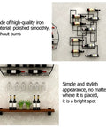 Badass Rock Solid Heavy Duty Wall Wine Rack With Rust Proof Iron Construction Stemware Holder And Spacious Floating Bar Shelf, showcasing multiple bottles and glasses.
