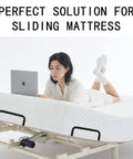 Ditch The Daily Slide, Keep Your Mattress Locked Down With These Heavy Duty Retainer Bars on a platform bed with a laptop.
