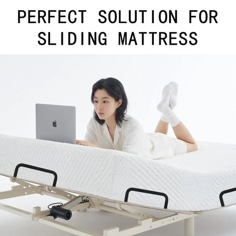 Ditch The Daily Slide, Keep Your Mattress Locked Down With These Heavy Duty Retainer Bars on a platform bed with a laptop.