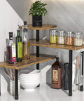 Hella Practical 3 Tier Kitchen Countertop Organizer And Rustic Brown Corner Shelf, holding oils and spices, mounted in a corner.