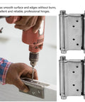 Installing Stainless Steel Spring Door Hinges 3 Inch, 2 Pack Auto Close Double Swing Door Hardware with a drill on a white door.