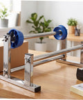 Manual Roll Film Dispenser For Stretch Wrapping Film And Cargo Packaging Supplies on desk, stainless steel frame with blue rollers