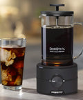 Dorothy Electric Rapid Cold Brewer For Home Coffee Making Quick Cold Brew In Just 15 Minutes No More 12 To 24 Hour Wait Tornado Stir Technology Delivers Smooth Cafe Style Cold Brew At Home, shown with a glass of iced cold brew