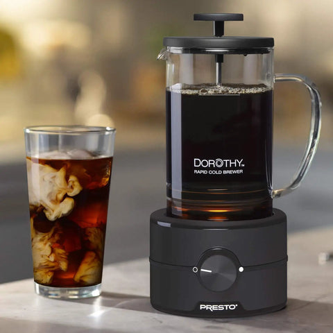 Dorothy Electric Rapid Cold Brewer For Home Coffee Making Quick Cold Brew In Just 15 Minutes No More 12 To 24 Hour Wait Tornado Stir Technology Delivers Smooth Cafe Style Cold Brew At Home, shown with a glass of iced cold brew
