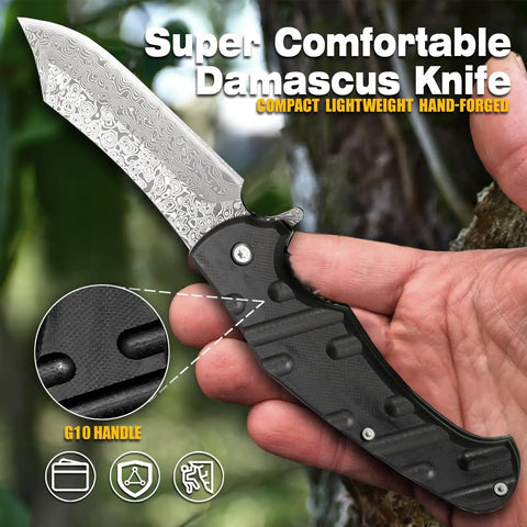 Close-up of hand holding Beefy 67 Layer Damascus Steel Folding Pocket Knife with VG10 core and G10 handle.