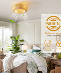 Coastal Boho 20 Inch Ceiling Fan With Light Rattan Caged Flush Mount in modern bedroom setting with reversible motor remote.