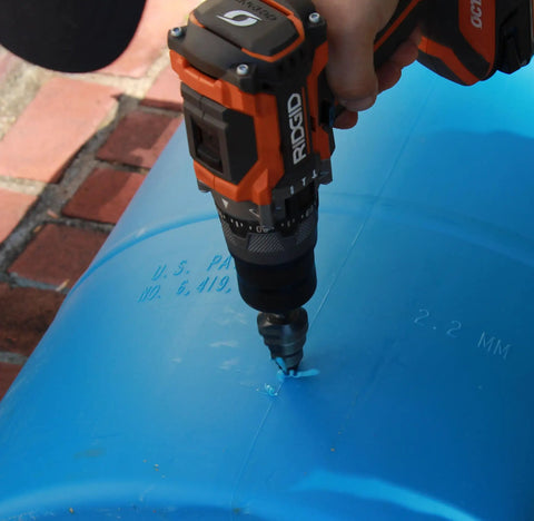 Versatile Step Drill Bit For RainPal SDB125 With Seven Eighths Inch, One And One Sixteenth Inch, And One And A Quarter Inch Steps in use