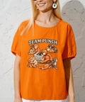 Woman wearing orange T-shirt with Funny Monkey Team Punchs DTF Transfers Pack Ready To Press Heat Transfer Stickers design.
