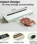 Compact Food Vacuum Sealer With 75kPa Suction And Digital Countdown Timer sealing meat in a bag, includes display and precision seal.