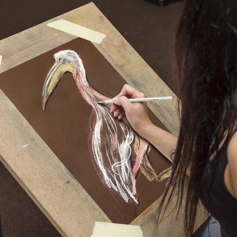 Artist using White Charcoal Pencil Set Six Pack For Dark Paper Highlights And Sketching Pro Grade Blendable Pencils For Drawing
