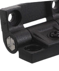 Close-up of black high strength plastic cabinet door hinge with adjustable torque friction for kitchen, bathroom, office desks.