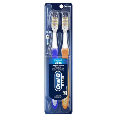 Next Level Battery Powered Electric Toothbrush With Durable Medium Bristles Eliminates Plaque And Keeps Your Brightest Smile On The Road two pack of blue and orange toothbrushes in packaging.