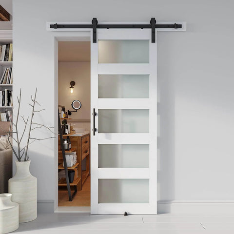 White Glass Barn Door Slab 28 By 84 Inches With Frosted Glass installed in interior with included hardware kit and handle.