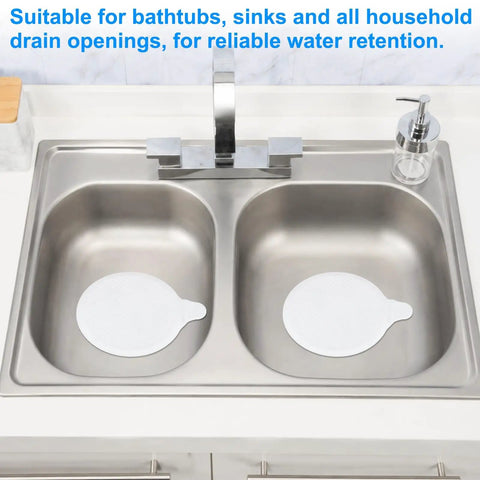 M METERXITY 4-Pack 5.9 in Silicone Tub Stopper, Bathtub Drain Stopper placed in stainless steel sink for water retention.