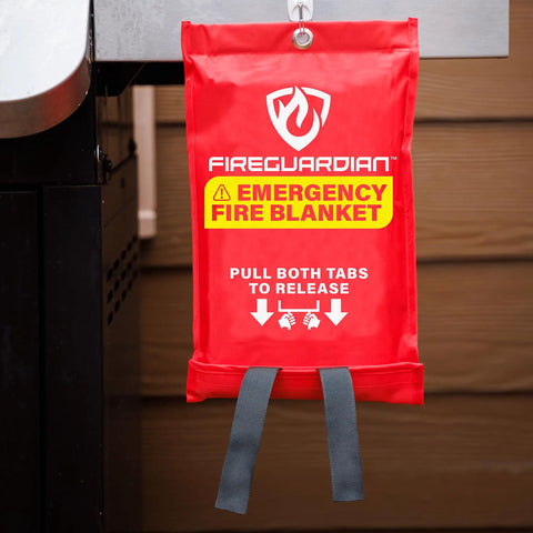 Red pouch of Emergency Fire Blanket 40 By 40 Inches, Woven Fiberglass Fire Shield hanging by a grill for safety use.