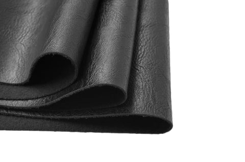 Thick Faux Leather PU Fabric With Soft Skin Grain for furniture covers, black, folded view, showing texture and material