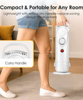 Person carrying 700W Oil Filled Radiator Heater with adjustable thermostat and silent operation, showcasing portability in a living room.