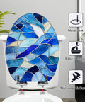 Elongated Blue Stained Glass Effect Abstract Mosaic Flowing Toilet Seat shown on a toilet, emphasizing blue mosaic design.