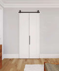 36 in. by 84 in. Bi-Fold Door Set With Hardware Kit, Shaker Style Flat Panel Primed Door installed in room