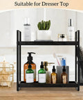 Coffee Station Organizer For Counter With Two Tier Wood Shelves And Three Compartment Pod Storage For Coffee Pods Sugar Tea Bags And Instant Coffee Sleek Black Kitchen Counter Rack holding toiletries and decor items.