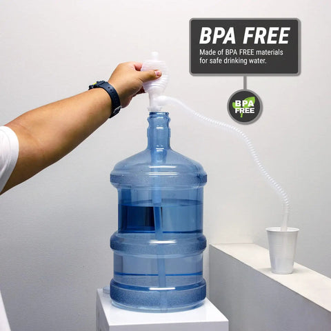 Heavy Duty Manual Siphon Hand Pump For Water And Fuel Transfer Featuring Flexible Hose in use with water cooler.