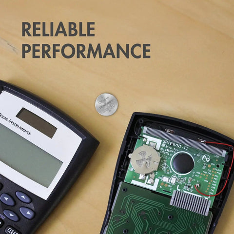 Top Shelf CR1616 3V Lithium Coin Cell Batteries 5 Pack Ready To Go Button Cells placed near a calculator.