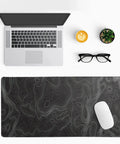 Extended Large Gaming Mouse Pad Desk Mat 27.6x11.8 Inches with 3mm non-slip base showing topographic design beside laptop and mouse.