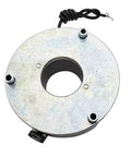 Round silver metal motor holding brake mounting plate with central bore, three mounting holes and attached wiring.