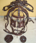 Nylon Horse Driving Harness With Patchwork Bridle, Padded Western Bridle, And Synthetic Leather Padding on display stand