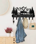 Custom Name Wall Key Holder With Forest Deer Design Dope Metal Coat Rack With Hooks For Bedroom Kitchen And Office Personalized Key Hanger Decor For Home Organization And Stylish Entryway hung on wall with items.