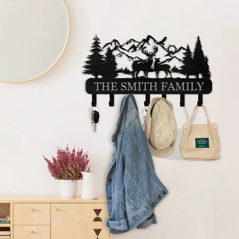 Custom Name Wall Key Holder With Forest Deer Design Dope Metal Coat Rack With Hooks For Bedroom Kitchen And Office Personalized Key Hanger Decor For Home Organization And Stylish Entryway hung on wall with items.