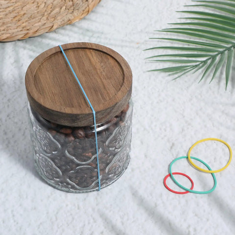 Glass jar with wooden lid secured by rubber band, surrounded by colored rubber bands; suited for 60 Pcs Rubber Pulley Belt Set For RC Cars Airplanes Robots Trucks And DIY Models Durable Transmission Belts In Multiple Sizes 23mm To 60mm Includes Colored Rubber Bands Must Have Replacement Parts And Toy Accessories.