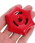 Red iron valve hand wheel with 6mm by 6mm square hole, shown in hand. Two Pack Iron Valve Hand Wheels With 6mm By 6mm Square Hole, Sturdy Grip