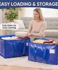 Woman packing clothes in Ultra Large Moving Bags With Heavy Duty Zippers And Sturdy Carry Handles Waterproof Storage Bags For Moving Closet Organization And Camping 16 Pack Blue.