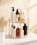 Two Pack Two Tier Clear Acrylic Lazy Susan Turntable Organizer showcasing bathroom products on a smooth rotating tray.