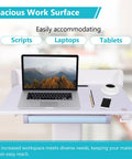 Effortless Height Adjustment Mobile Standing Desk With Quiet Rolling Wheels 28x23 Desktop featuring spacious work surface, laptop, and coffee.