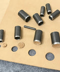 Leather Circle Cutter Set 31 Piece Circle Punch Kit With 1mm To 55mm Holes on leather, showcasing cutouts and steel punches